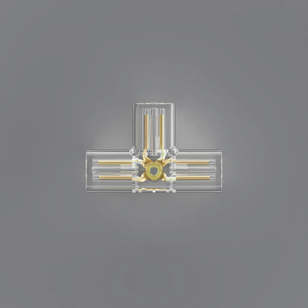A clear acrylic or glass wall sconce with gold-toned metal rods and a central circular gold accent, shown against a solid gray background.